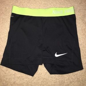 Black nike pro! With neon band! Used a few times